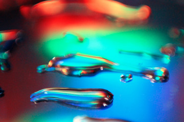 translucent liquid dripping on white background