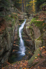 Podgorna Waterfall in the autumn scenery in Przesieka, Sudety, Poland
