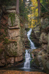 Podgorna Waterfall in the autumn scenery in Przesieka, Sudety, Poland
