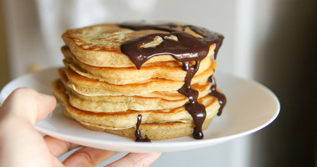 Breakfast, homemade classic american pancakes with chocolate syrup