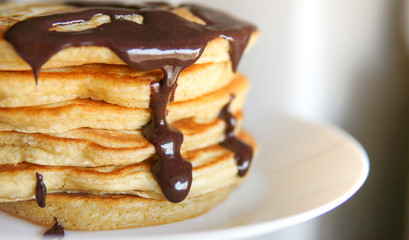 Breakfast, homemade classic american pancakes with chocolate syrup