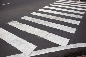 cross walk on asphalt road.