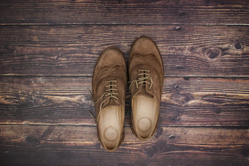 Woman shoes on wooden background