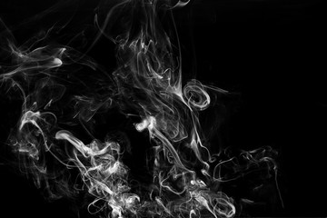 white smoke flame on a black background