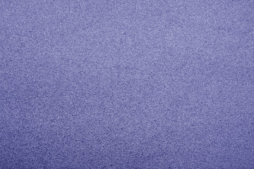 Fototapeta na wymiar Plastic glittering texture in blue color.