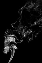 white smoke flame on a black background