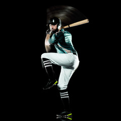 one caucasian baseball player man  studio shot isolated on black background with light painting speed effect