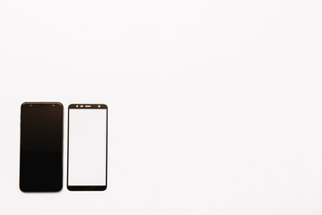 Smart phone with tempered glass shield,film screen cover .protector concepts ideas. white background