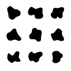 Black spots of different curve shapes set. Fluid smooth spots.
