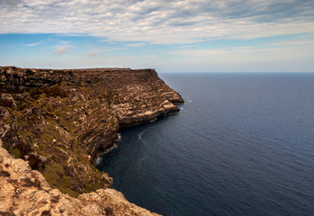 Fototapeta na wymiar View of the scenic cliff coast of Lampedusa