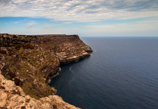 View of the scenic cliff coast of Lampedusa © bepsphoto