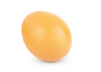 Brown egg on a white background