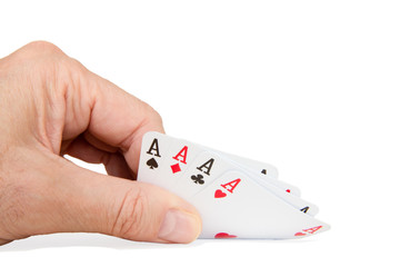 Obraz premium A man holds playing cards