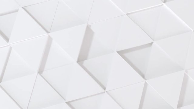 Abstract 3d geometric white triangle wall animation.  4k computer rendering footage. loop.