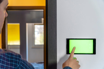 Smart home control device on a wall