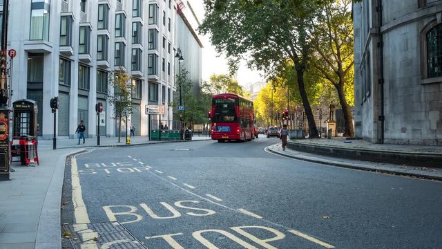 Time lapse of busy city traffic scene on the Strand, major thoroughfare in the City of Westminster, Central London, England.
