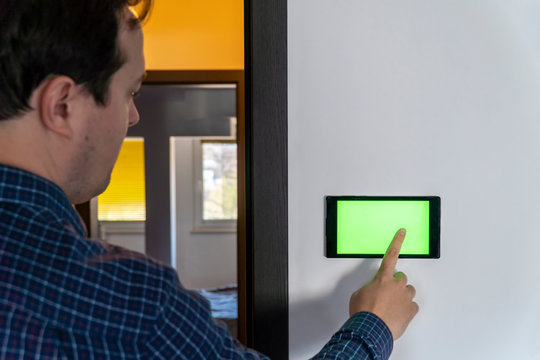 Smart home control device on a wall