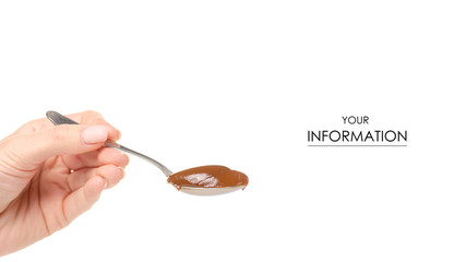 Boiled condensed milk in a spoon in hand pattern on a white background. Isolation