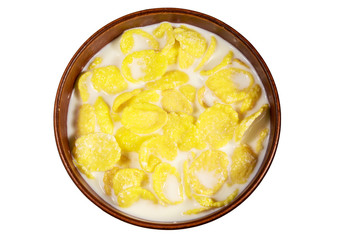 Cornflakes with milk in a bowl isolated on white background