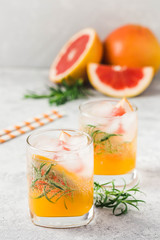 Grapefruit sunrise refreshing cocktail. Selective focus, space for text.
