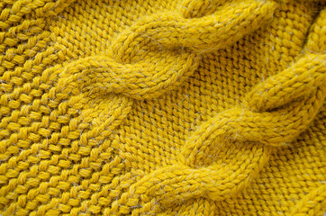 Knitted background. Knitted texture. Knitting pattern of wool. Knitting. Background.