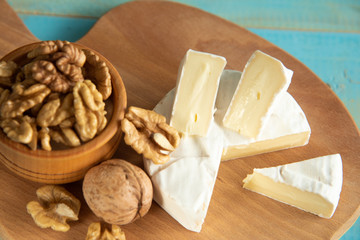 Cheese camembert or brie with walnut kernels