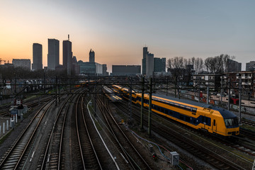 Fototapeta na wymiar The Hague (Den Haag in Dutch) skyline during the sunset moment behind the train station