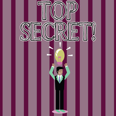 Handwriting text Top Secret. Conceptual photo highest secrec highly confidential files informations or places Businessman Standing Raising Arms Upward with Lighted Bulb Icon on his Head
