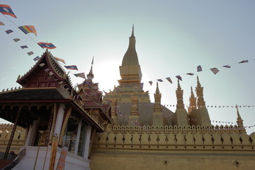 Fototapeta premium Vientiane Laos -, 1 Apr. 2019; Pha That Luang (Gold Stupa) or “Great Stupa” was built in 1566 after King Setthathirath had made Vientiane the new capital of the Lan Xang Kingdom.