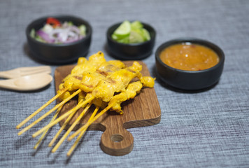 Pork satay eating with your peanut sauce