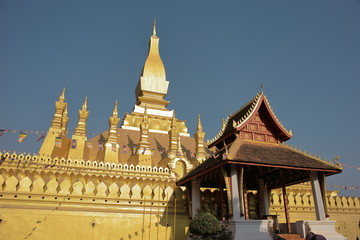 Fototapeta na wymiar Vientiane Laos -, 1 Apr. 2019; Pha That Luang (Gold Stupa) or “Great Stupa” was built in 1566 after King Setthathirath had made Vientiane the new capital of the Lan Xang Kingdom.