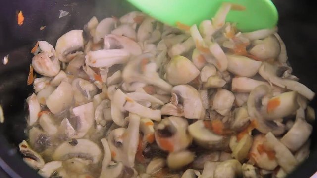 Cooking a Mushroom Soup in a Restaurant