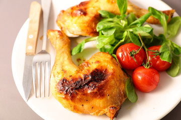 grilled chicken leg and salad