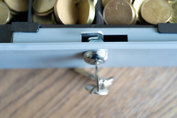 Cashbox lock with keys and full of Coins