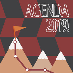 Word writing text Agenda 2019. Business photo showcasing list of items to be discussed at formal meeting or event Three Mountains with Hiking Trail and White Snowy Top with Flag on One Peak