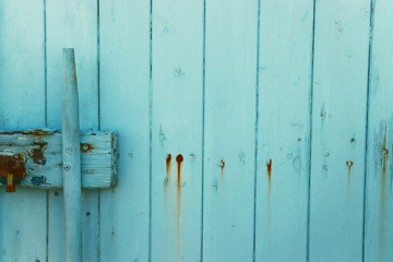 background of old light blue grunge wooden texture. part of antique old door
