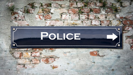 Street Sign to Police