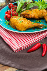 Chicken legs seasoned with curry