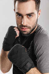 Fototapeta premium Sports fitness man boxer isolate over white wall background make exercises.