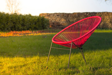 Chaise ou fauteuil acapulco dans un jardin