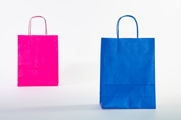 Set of colorful empty shopping bags isolated on the white background.