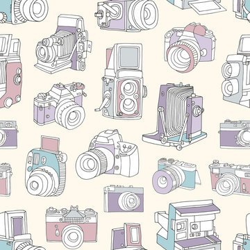 Seamless pattern with film and digital photographic or photo cameras on light background