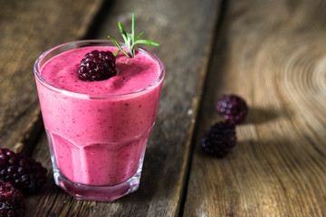 Fresh blackberry smoothies in a glass