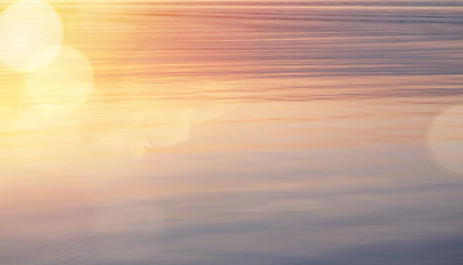 Beautiful abstract shiny light and glitter water sunrise background