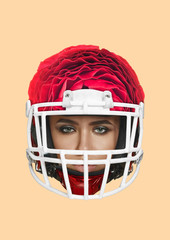 A tender safety and protection. Girl's or young woman's head in american football or sporty helmet...