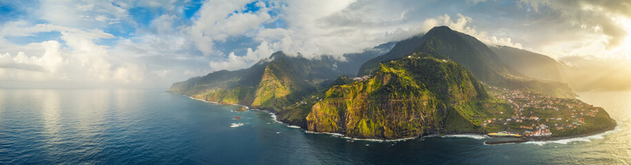 Beautiful mountain landscape of Seixal, Madeira island, Portugal, at sunset. Aerial panorama view. - obrazy, fototapety, plakaty