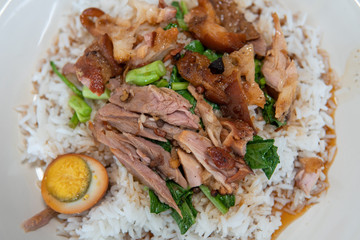 Stewed pork leg on rice, Thai food.