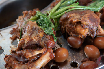 stewed pork leg with green kale,Thai food.