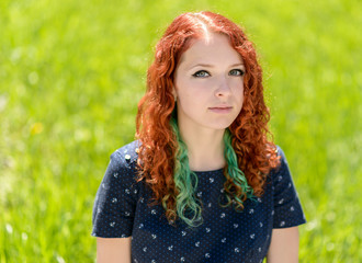 Portrait of a beautiful redhead girl.