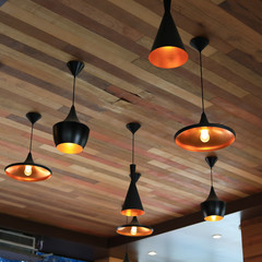 modern light lamp hanging interior decorative on wooden celling in cafe